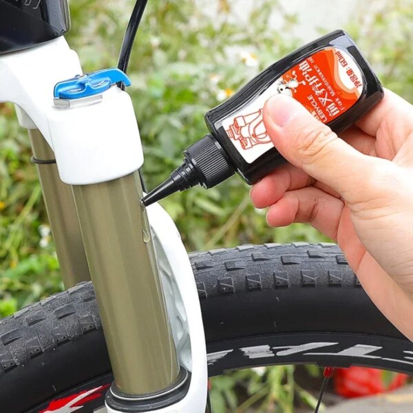 Amortiguador de horquilla delantera para bicicleta de montaña, 60ML, aceite, amortiguador delantero y trasero, aceite de silicona, mantenimiento de aceite lubricante